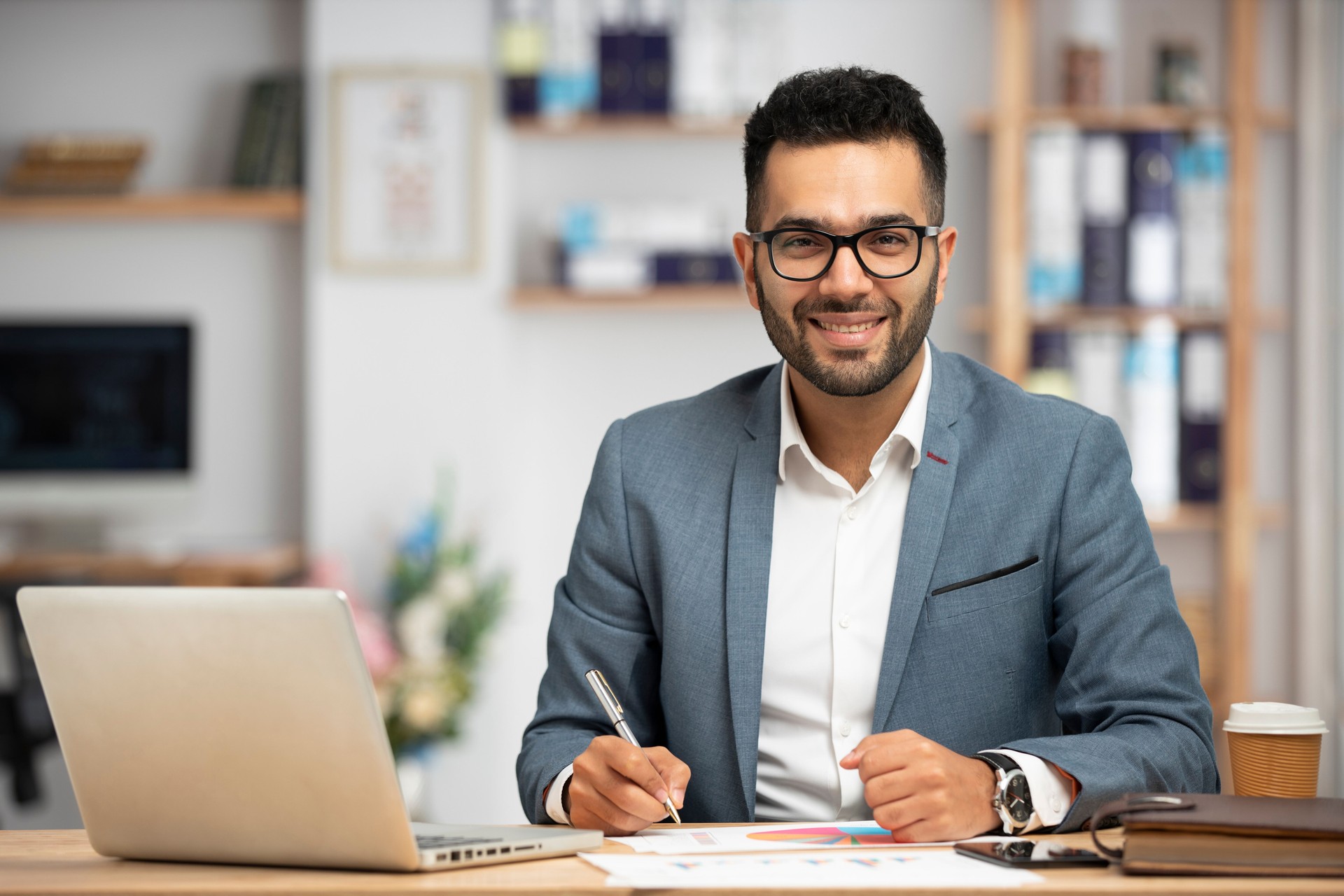 Portrait of a handsome young businessman working in office